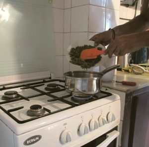 Heating the water and adding the cannabis